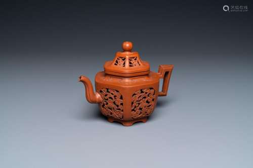 Lot 969: A CHINESE RETICULATED DOUBLE-WALLED YIXING STONEWAR...