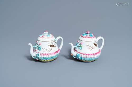 Lot 972: A PAIR OF CHINESE FAMILLE ROSE TEAPOTS AND COVERS W...