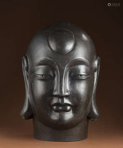 Ancient bronze Buddha head