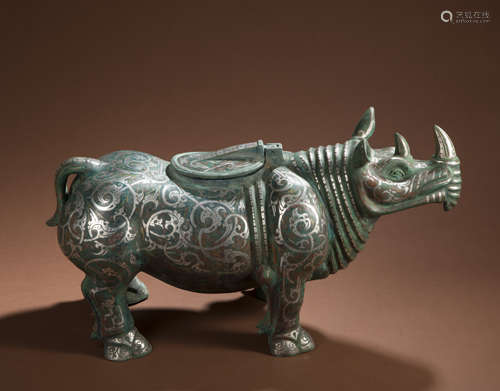 Bronze and silver mowed rhino statue in warring States perio...