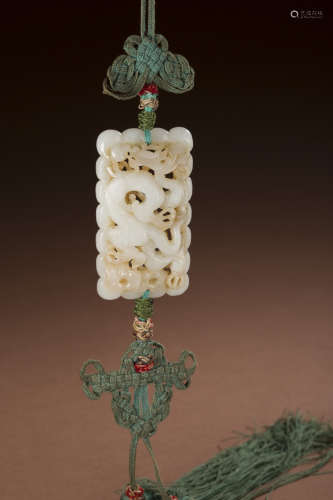 Ming Dynasty Hetian jade dragon shaped pendant