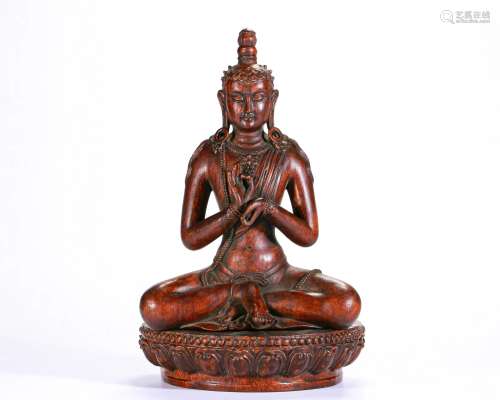 A Carved Aloeswood Seated Guanyin Qing Dyn.