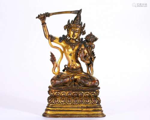 A Tibetan Bronze-gilt Figure of Manjusri