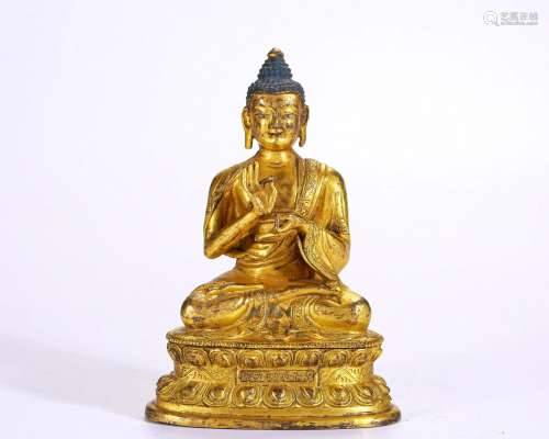 A Tibetan Bronze-gilt Figure of Dipamkara