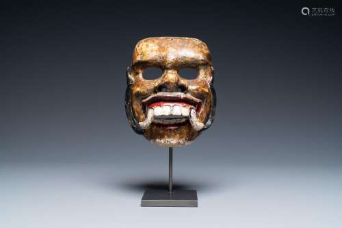 Lot 1082: A POLYCHROMED WOODEN MASK, JAVA, INDONESIA, 19TH C...