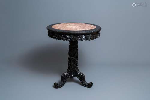 Lot 1086: A ROUND CHINESE CARVED WOODEN MARBLE TOP TABLE, 19...