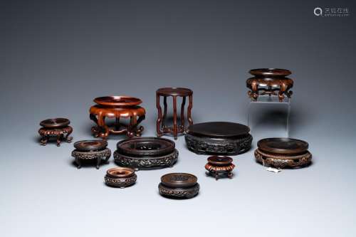 Lot 1089: A VARIED COLLECTION OF CHINESE WOODEN STANDS, 18/2...