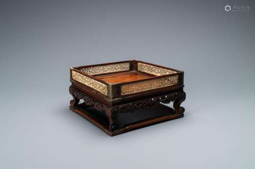 Lot 1095: A CHINESE SQUARE WOODEN TRAY WITH RETICULATED CARV...