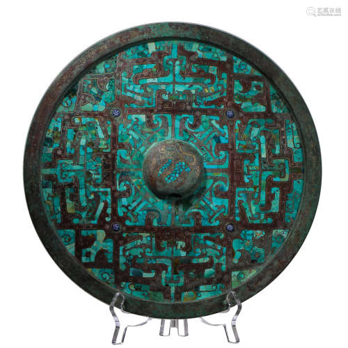 BRONZE MIRROR INLAID WITH GOLD AND STONE, DURING THE WARRING...