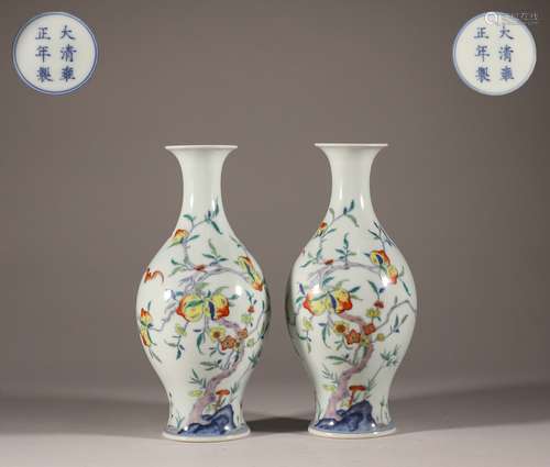 Qing Dynasty Yongzheng doucai nine peach olive bottle