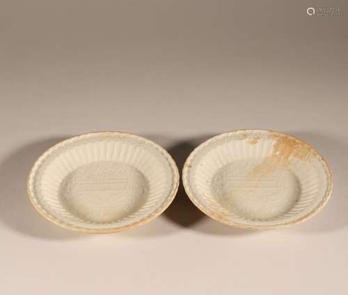 A pair of Ding kiln printing plates in Song Dynasty