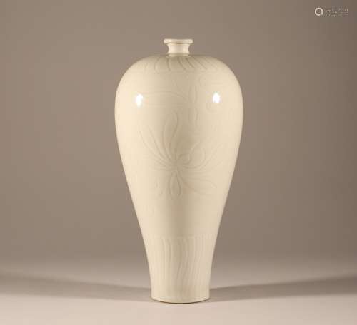 Carved plum vase with white glaze in Ding kiln of Song Dynas...