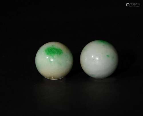 Two Chinese Jadeite Beads, 19th Century