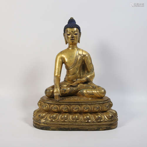 A Gilt Bronze Figure of Shakyamuni