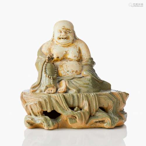 An Unusual Longquan Celadon Type Figure of Budai