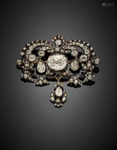 Gold and silver old mine diamond volute brooch with a centra...