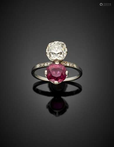 Platinum ring with a ct. 2.05 circa oval ruby and and a ct. ...