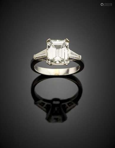 Rectangular ct. 2.98 diamond platinum ring finished with two...