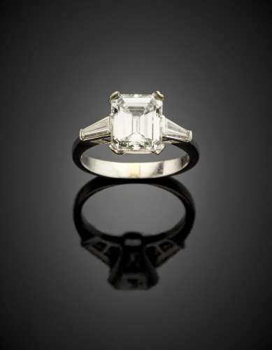 Rectangular ct. 2.98 diamond platinum ring finished with two...