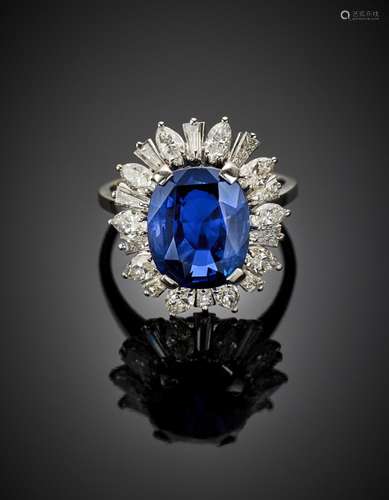 Oval ct. 8.83 sapphire with marquise and tapered diamond whi...