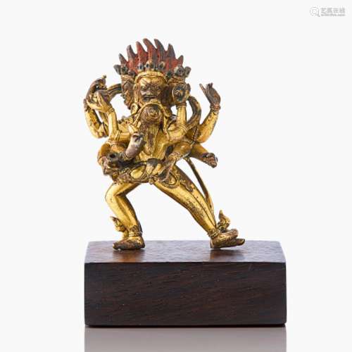A Gilt Bronze Tibeto-Chinese Figure of a Tantric Deity and C...