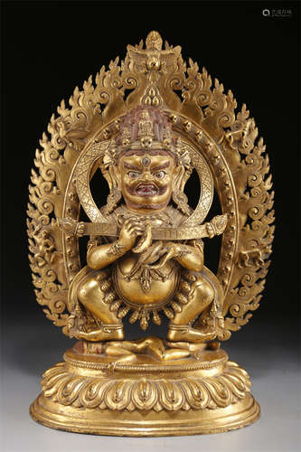 A Gilt Copper Two-Arm Mahakala Buddha Statue.