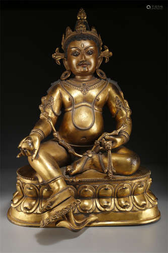 A Gilt Copper Yellow Wealthy Buddha Statue.