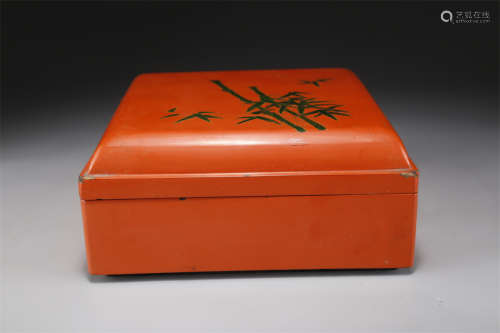A Red Lacquer Lidded Box with Bamboo Design.