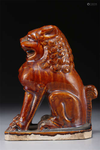 A Brown Glazed Ceramic Lion Sculpture.