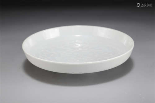 A White Glazed Porcelain Plate.