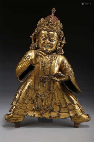 A Gilt Copper Two-Arm Mahakala Buddha Statue.