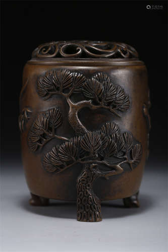 A Copper Incense Burner with Plants Design.