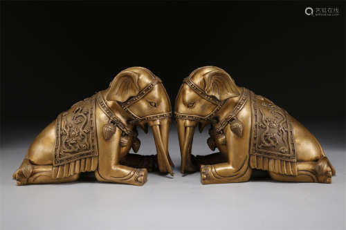 A Set of Copper Lying Elephant Sculptures.