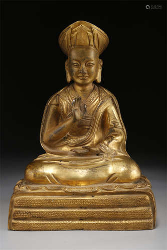 A Gilt Copper Guru Buddha Statue.