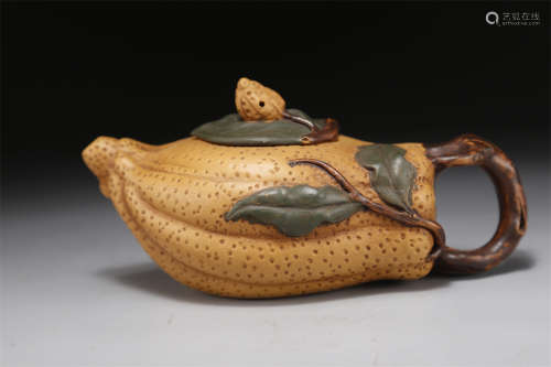 A Buddha's Hand Shaped Purple Clay Teapot.