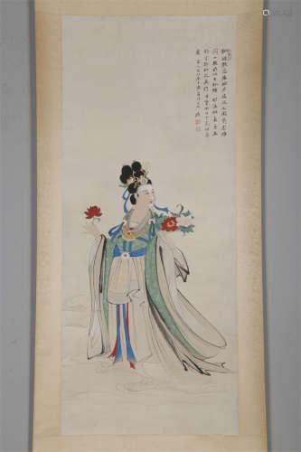 A Maid Painting on Paper by Zhang Daqian.
