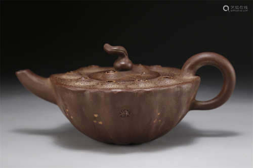 A Lotus Cupule Shaped Purple Clay Teapot.
