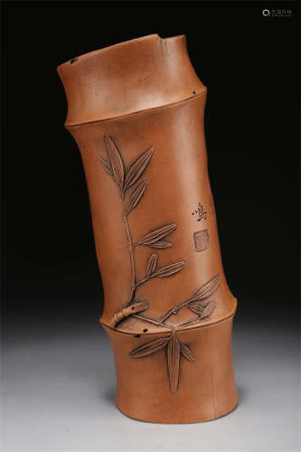 A Bamboo Joint Shaped Purple Clay Arm-Rest.