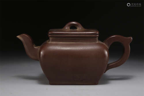 A Purple Clay Square Teapot.