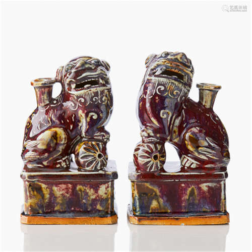 A Pair of Fo-Lion Candle Holders