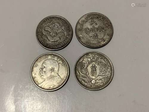 Four Chinese Coins