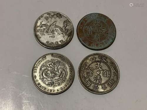 Four Chinese Coins