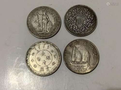 Four Chinese Coins