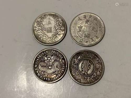 Four Chinese Coins