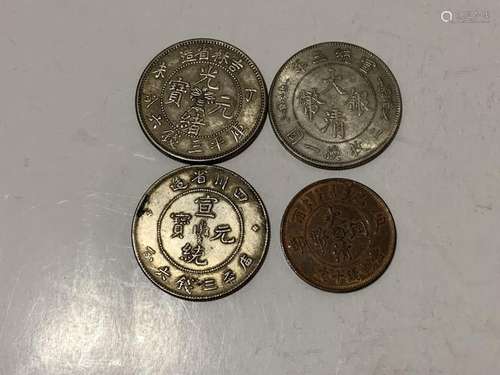 Four Chinese Coins