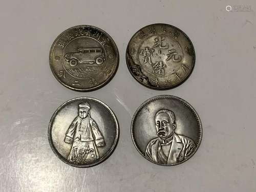 Four Chinese Coins