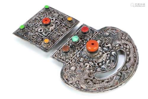 TWO LATE TIBETAN SILVERED METAL BELT BUCKLES