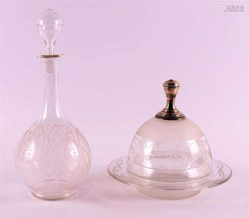 A clear crystal butter dish with silver knob, late 19th cent...