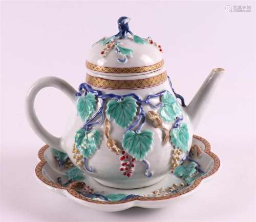 A porcelain teapot on a saucer, China, Yongzheng (1722-1735)...