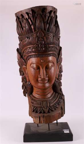 A tropical wooden bust of a dancer, Indonesia, early 20th ce...